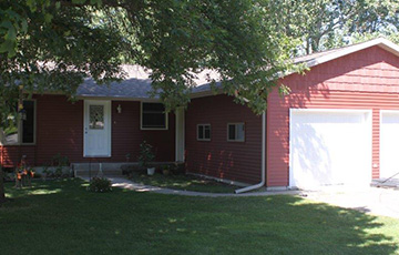Updated home with new windows and entry doors supplied by Long Prairie Lumber